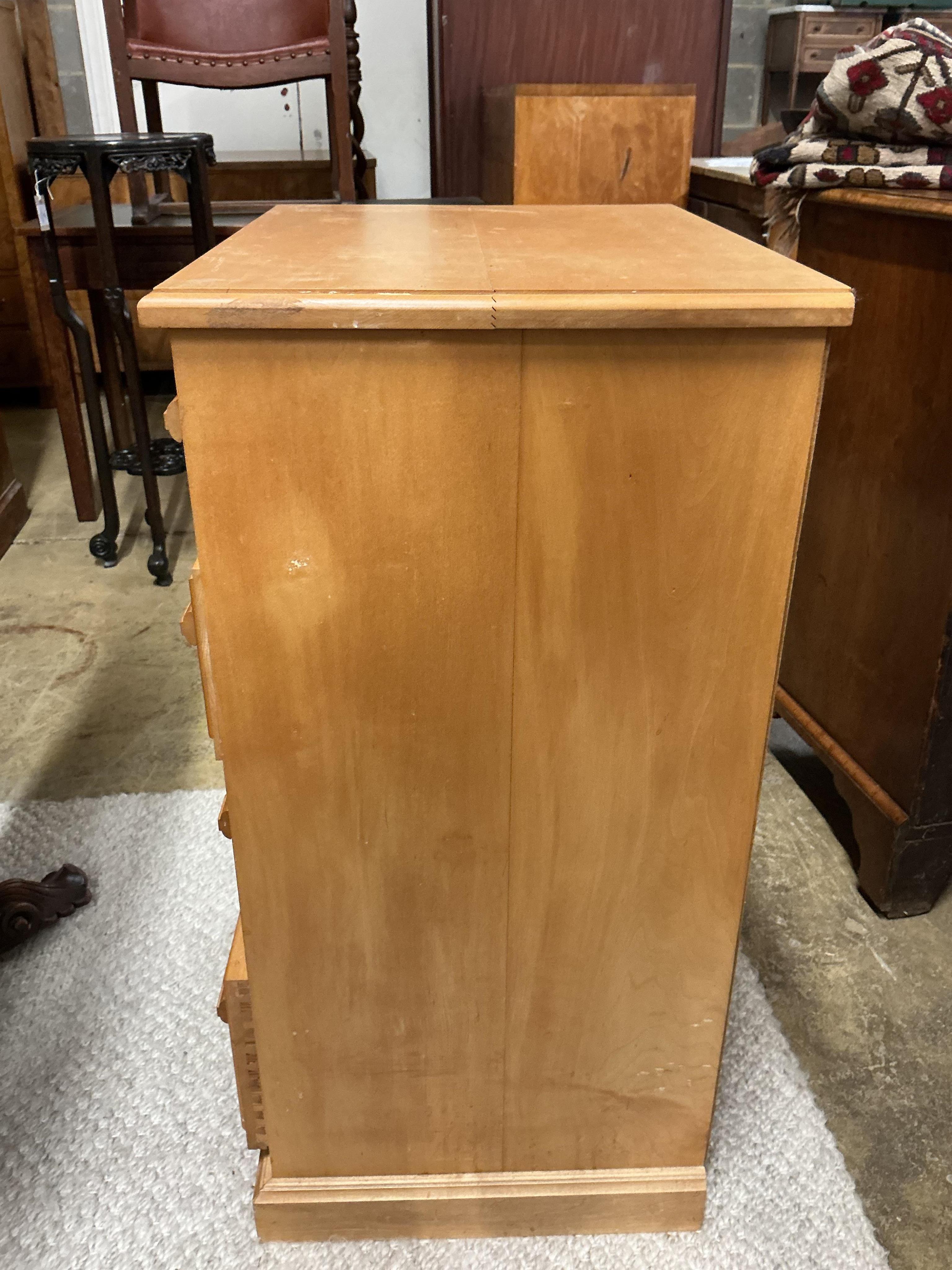 A Contemporary maple narrow chest of drawers, width 61cm, depth 46cm, height 92cm